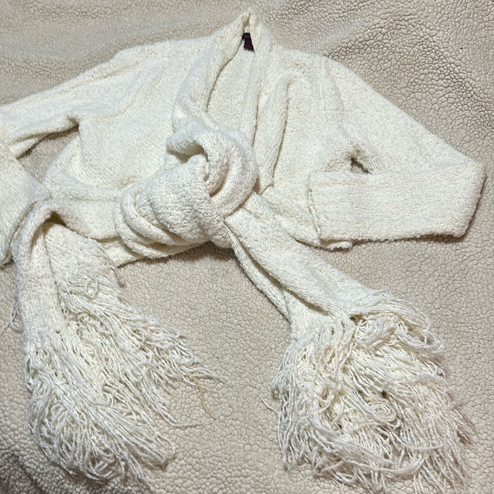 Wrap around sweater. Create many styles. Very sexy.